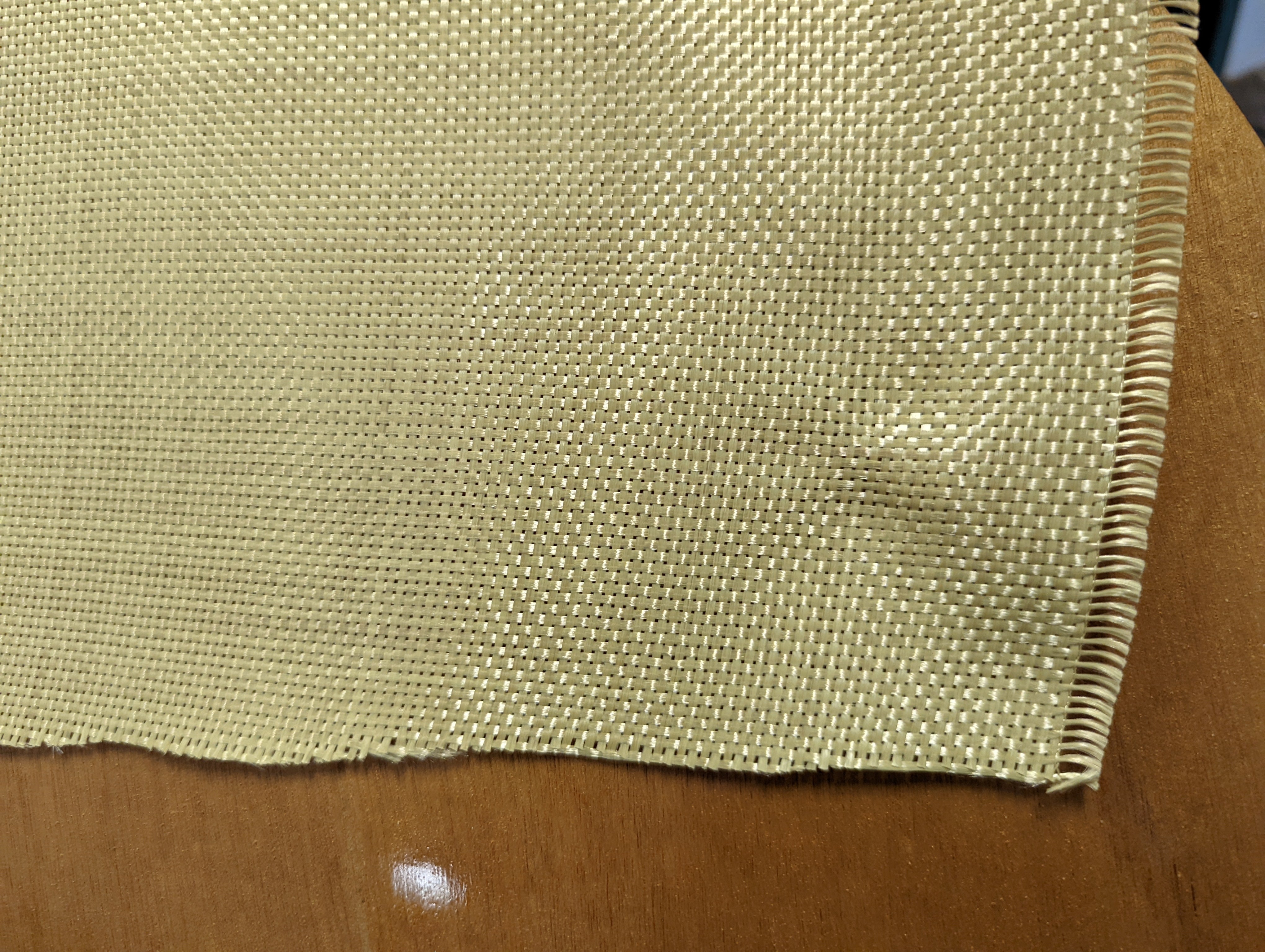 Cheap 400D 100g yellow plain weave aramid fiber cloth 100% Kevlar Fabric  folded for delivery